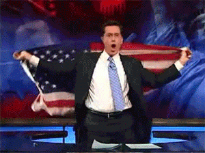 Stephen Colbert waving the American flag